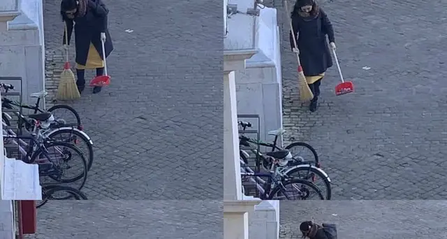 Una giapponese pulisce strada Pesaro