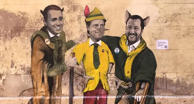 Murale a Roma con Conte-Pinocchio, Di Maio e Salvini gatto e la volpe