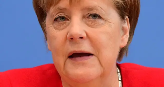 Merkel, mi dissocio da attacchi Trump