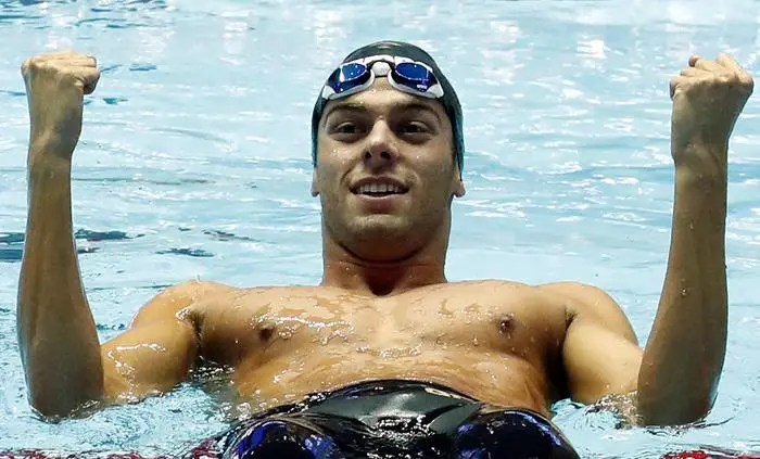 epa07736920 Gregorio Paltrinieri of Italy celebrates after winning the men's 800m Freestyle final of the swimming competitions at the Gwangju 2019 Fina World Championships, Gwangju, South Korea, 24 July 2019. EPA/JEON HEON-KYUN