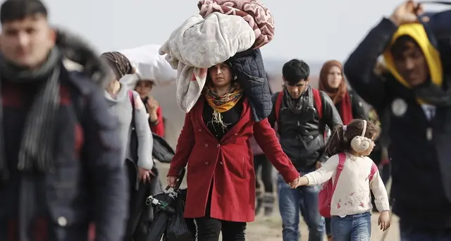 Siria, turchi sparano sui migranti, bimbo ucciso