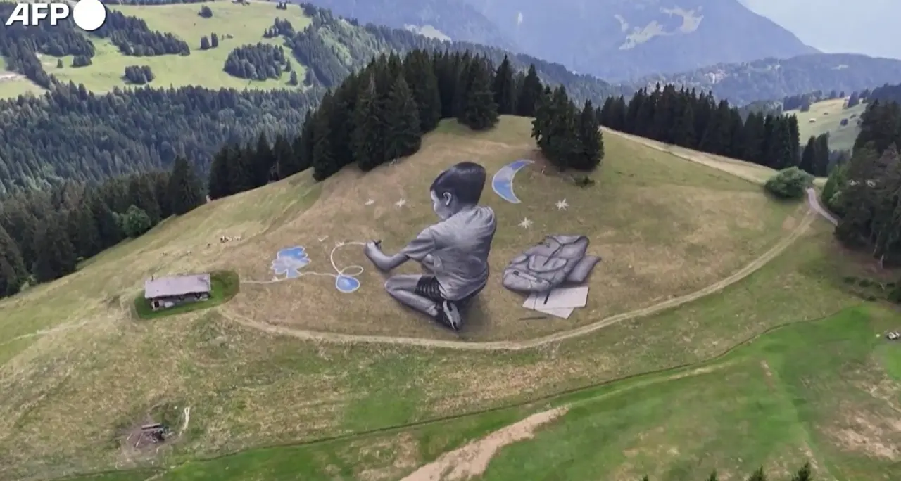 La creatività dei bambini sulle Alpi svizzere, il progetto dell'artista Saype