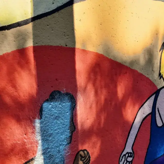 Bolzano, imbrattato il murale di Don Bosco: l’Anpi «Basta razzismo»