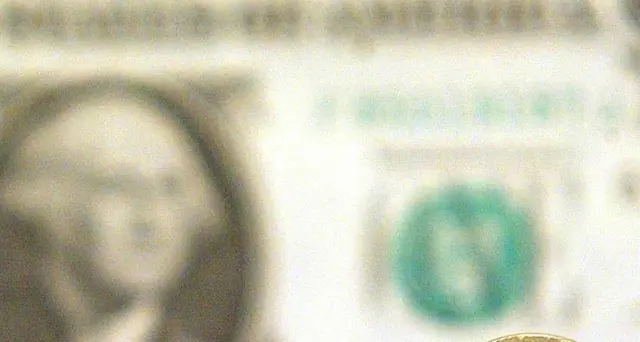Cambi: l'euro scende sotto la parità sul dollaro