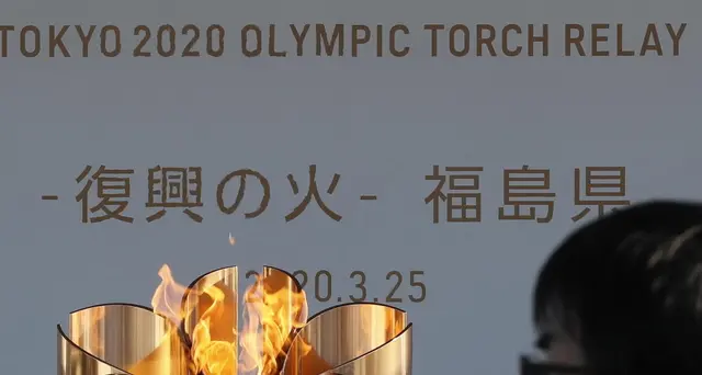 Tokyo: fiamma olimpica in città per staffetta senza pubblico